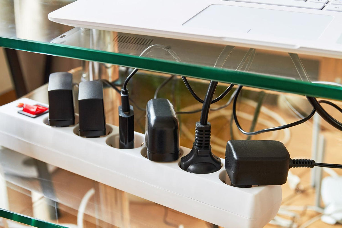 electrical-power-strip-overloaded-with-multiple-electrical-cords-plugged